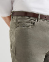Garment-dyed comfort lightweight denim traditional fit five-pocket trousers in Military Green